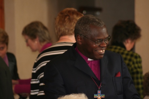 The Archbishop shares a joke with MU members