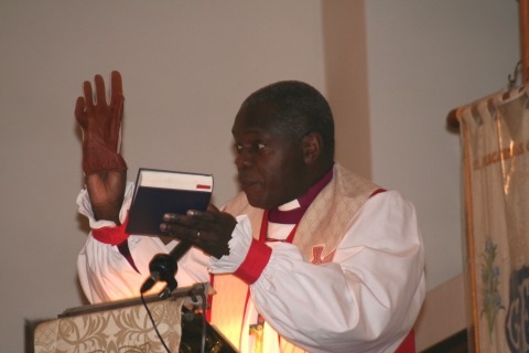 Dr Sentamu uses a glove to illustrate a point
